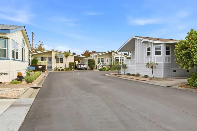 a view of a street in front of a house