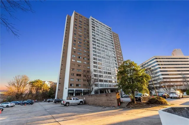 a front view of a building with street view
