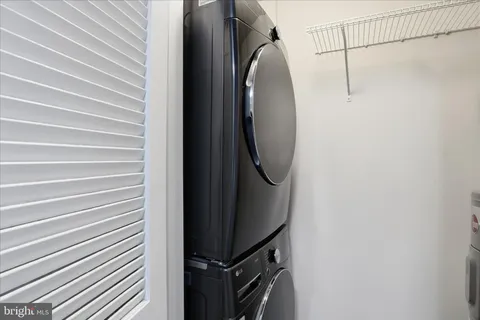 a view of a balcony with a forest