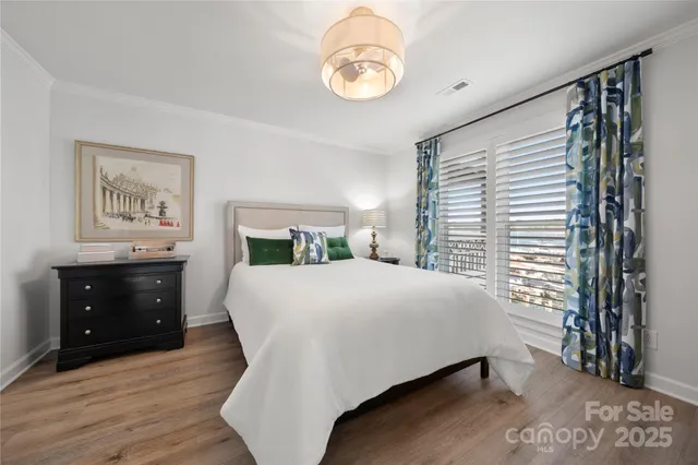 a spacious bathroom with a double vanity sink and mirror