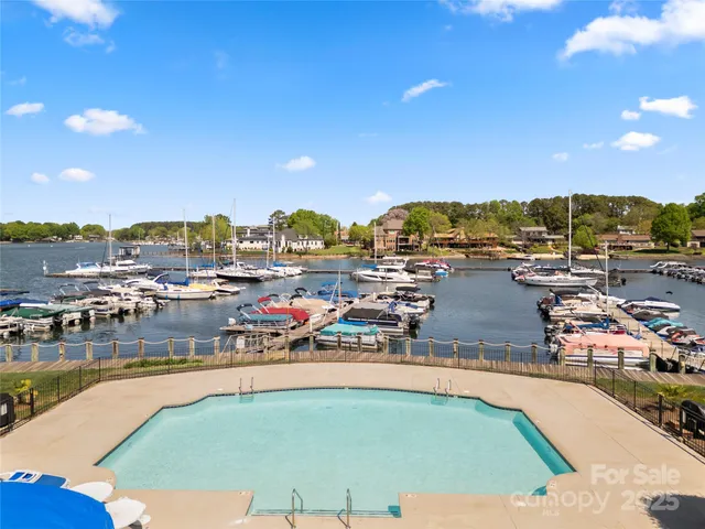 a view of a house with swimming pool