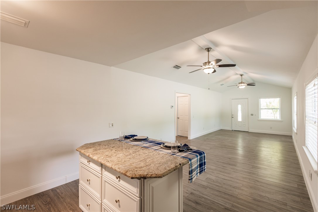 2502 Lake Trafford Road Immokalee, FL 34142 - Photo 11 of 15 wooden floor in an empty room with a window