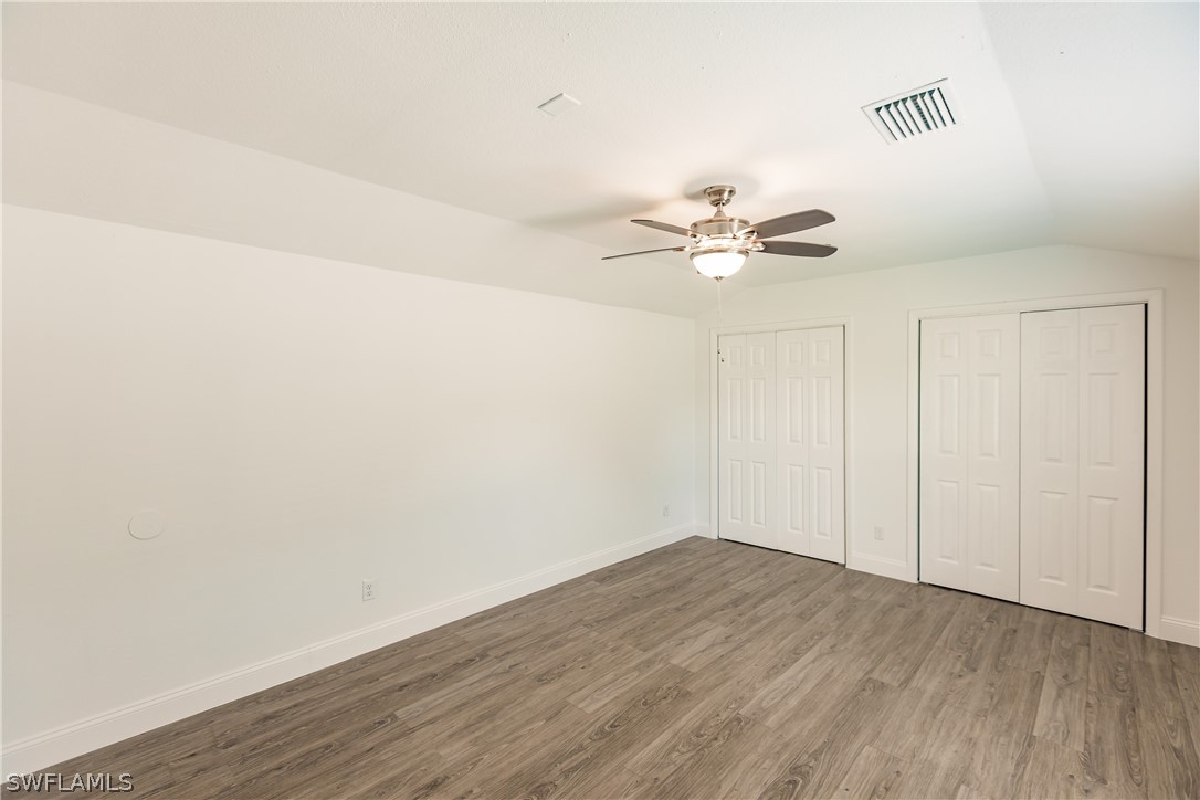 2502 Lake Trafford Road Immokalee, FL 34142 - Photo 13 of 15 wooden floor in an empty room