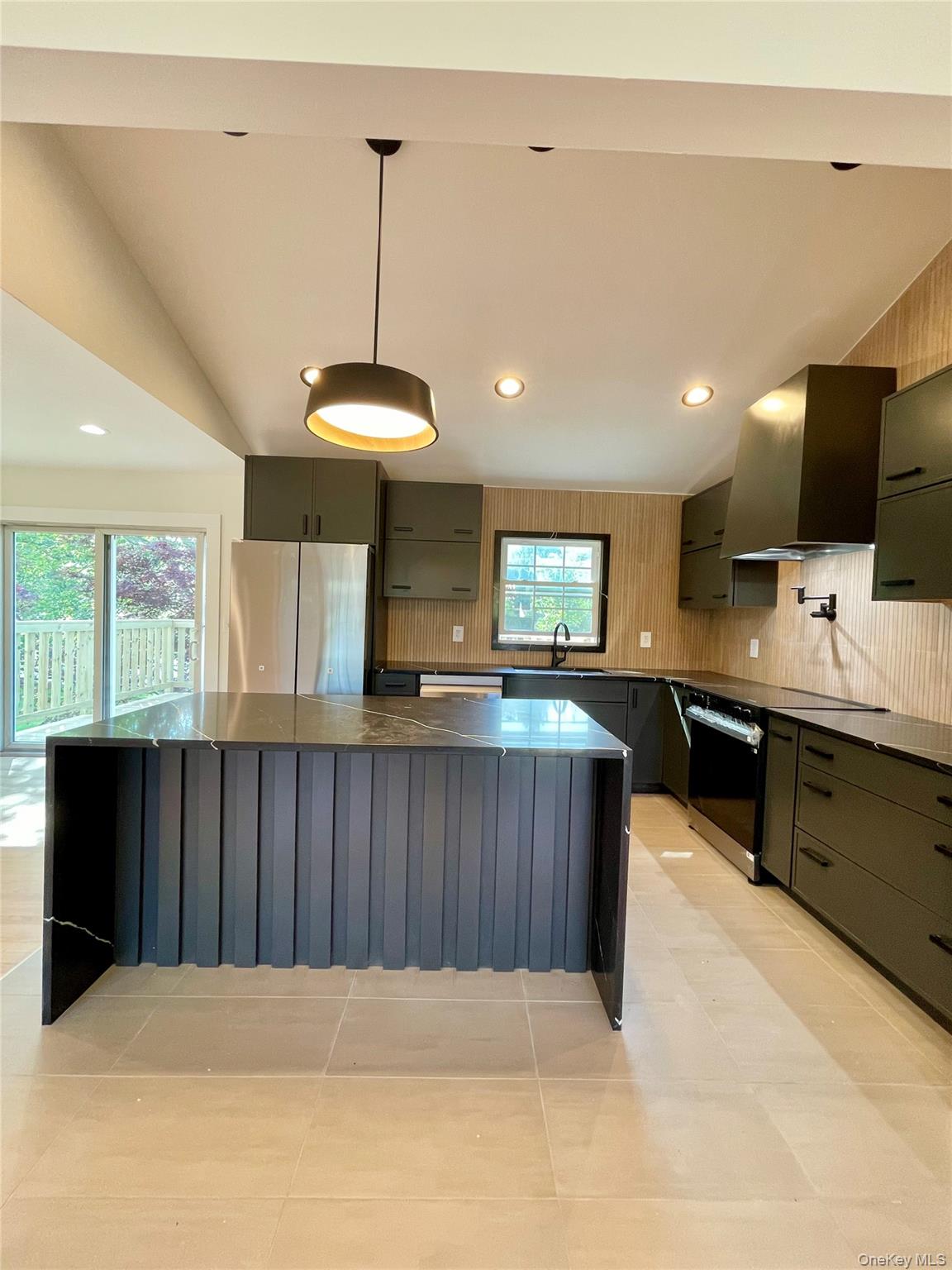 10 Frederick Middletown, NY 10941 - Photo 11 of 38 a kitchen with a refrigerator and a television