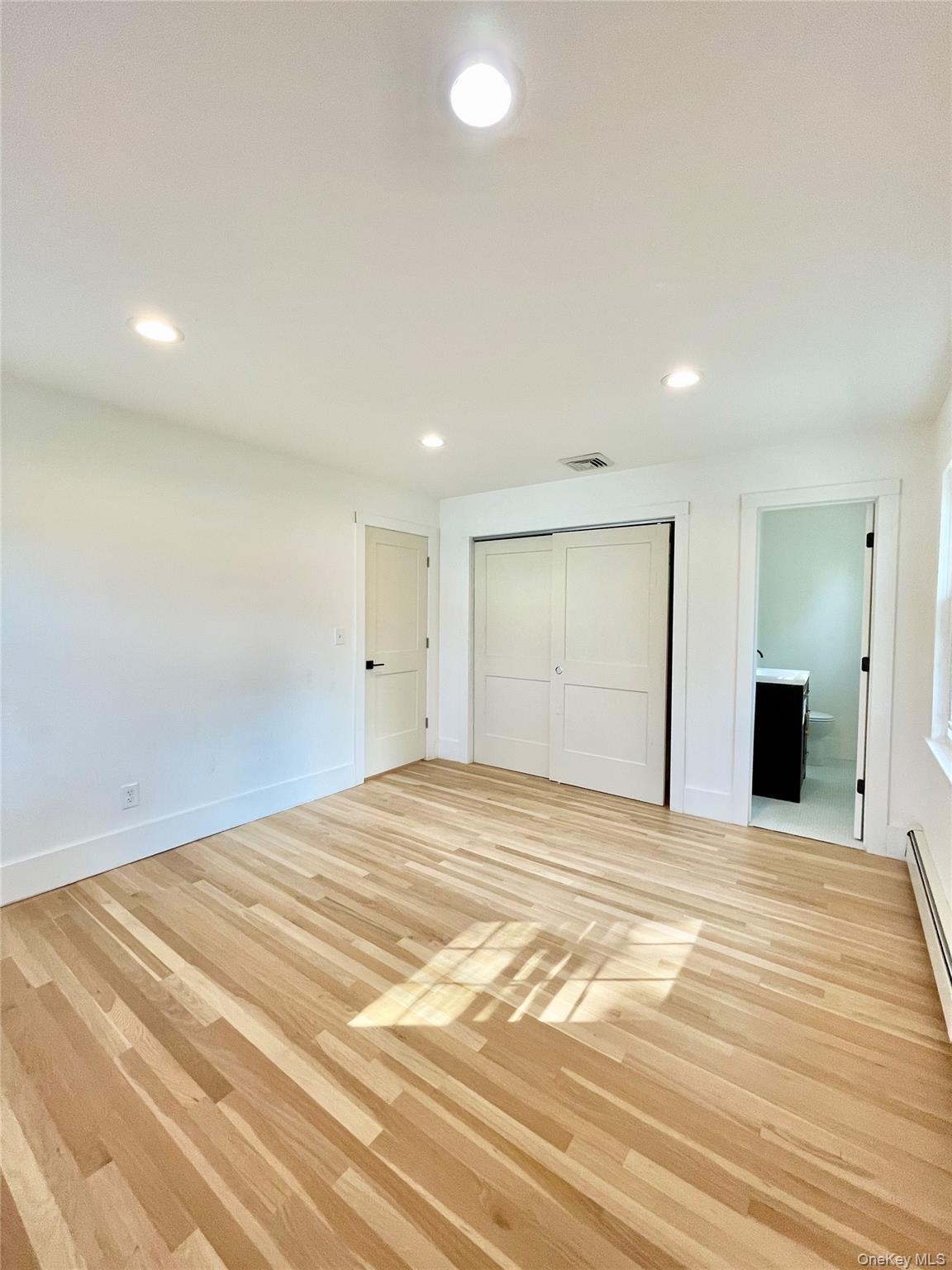 10 Frederick Middletown, NY 10941 - Photo 26 of 38 a view of an empty room with wooden floor and cabinet