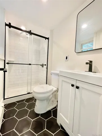 a view of a room with an empty space