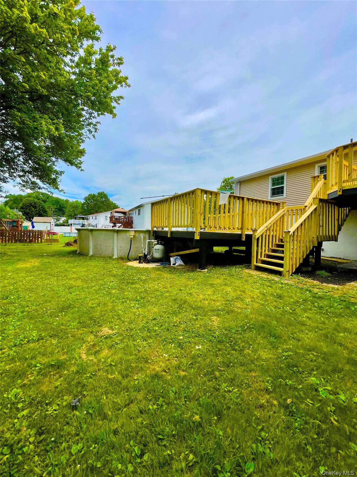 10 Frederick Middletown, NY 10941 - Photo 35 of 38 a view of swimming pool with deck and a garden