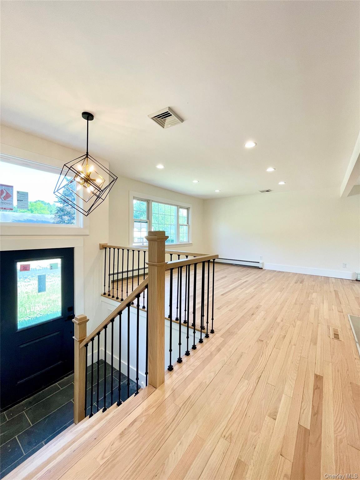 10 Frederick Middletown, NY 10941 - Photo 4 of 38 a view of a hallway with wooden floor and windows