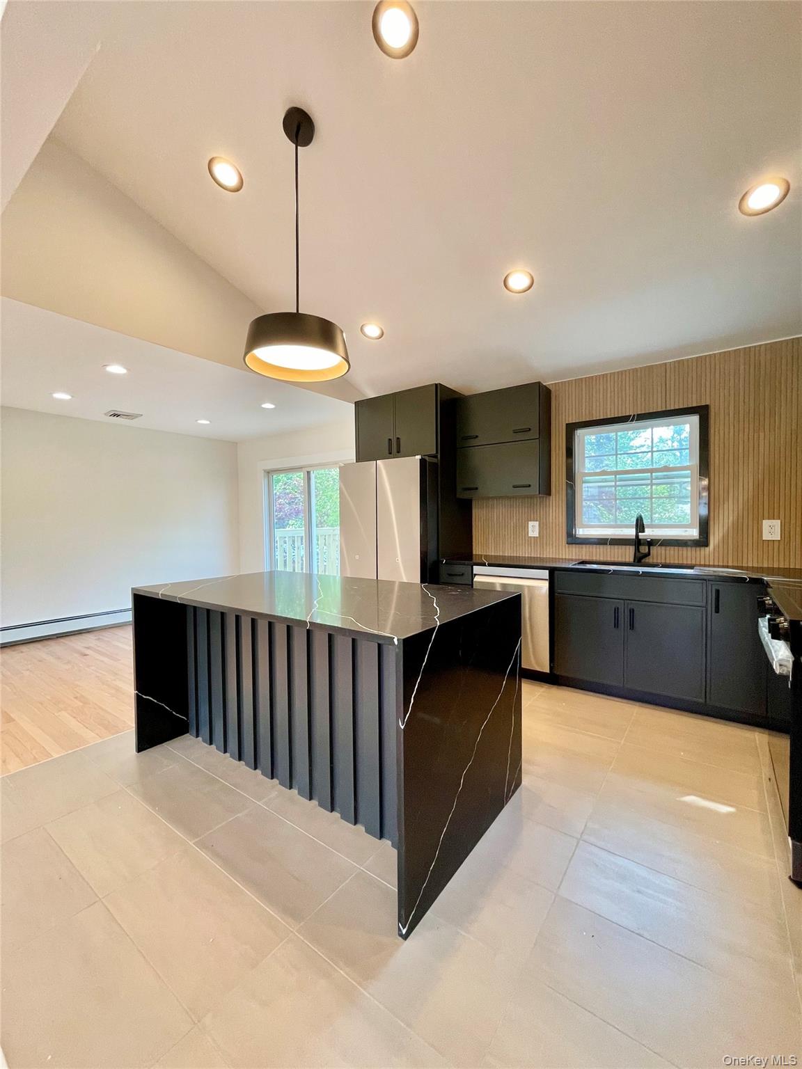 10 Frederick Middletown, NY 10941 - Photo 8 of 38 a kitchen with stainless steel appliances granite countertop a sink a oven and a refrigerator