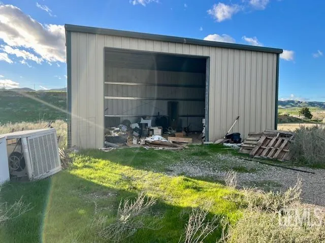 a view of a city with lawn chairs