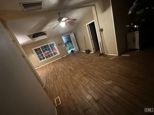 a view of room with stairs and a window