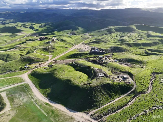 a view of a garden from a balcony