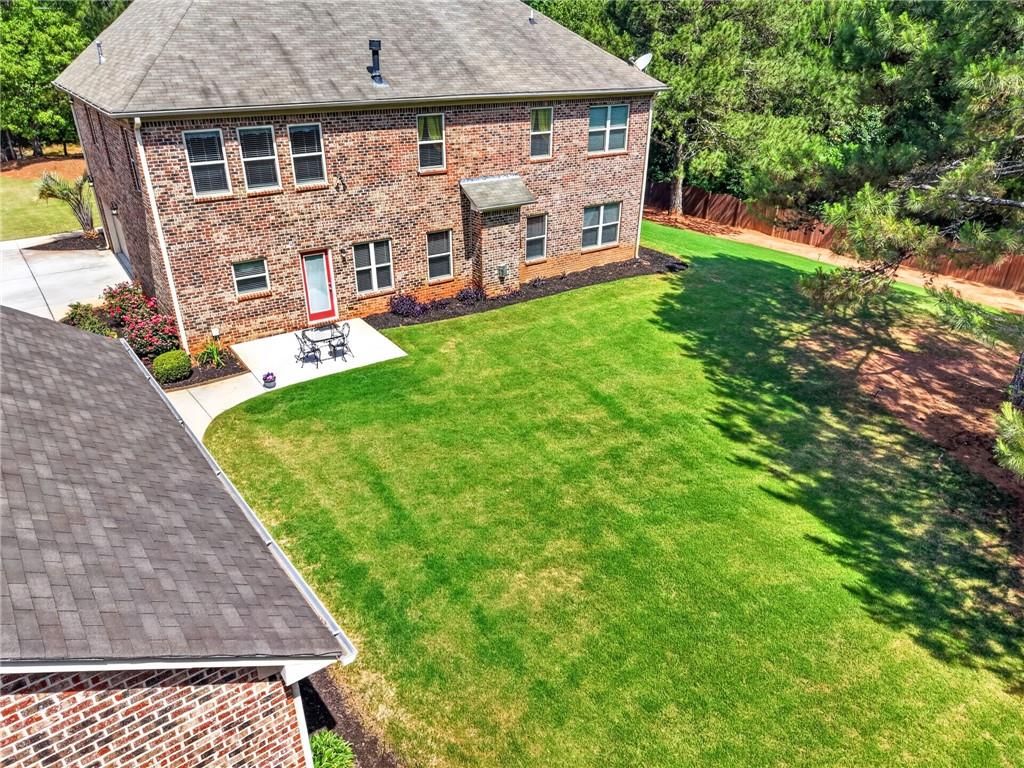 2300 Tucker Mill Road Southwest Conyers, GA 30094 - Photo 43 of 45 front view of a house with a yard