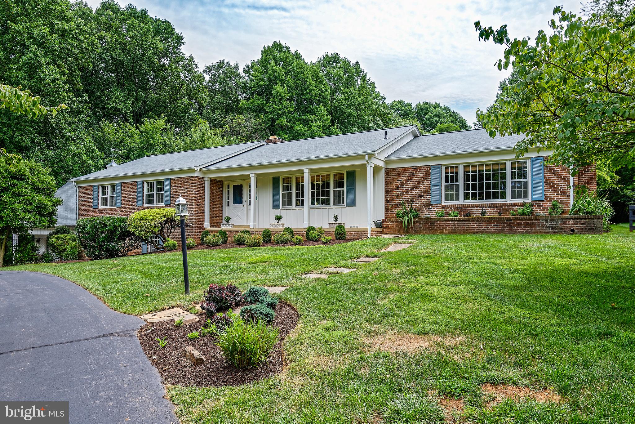 19366 Loudoun Orchard Road Leesburg, VA 20175 - Photo 2 of 40 Many large windows take in views from all sides