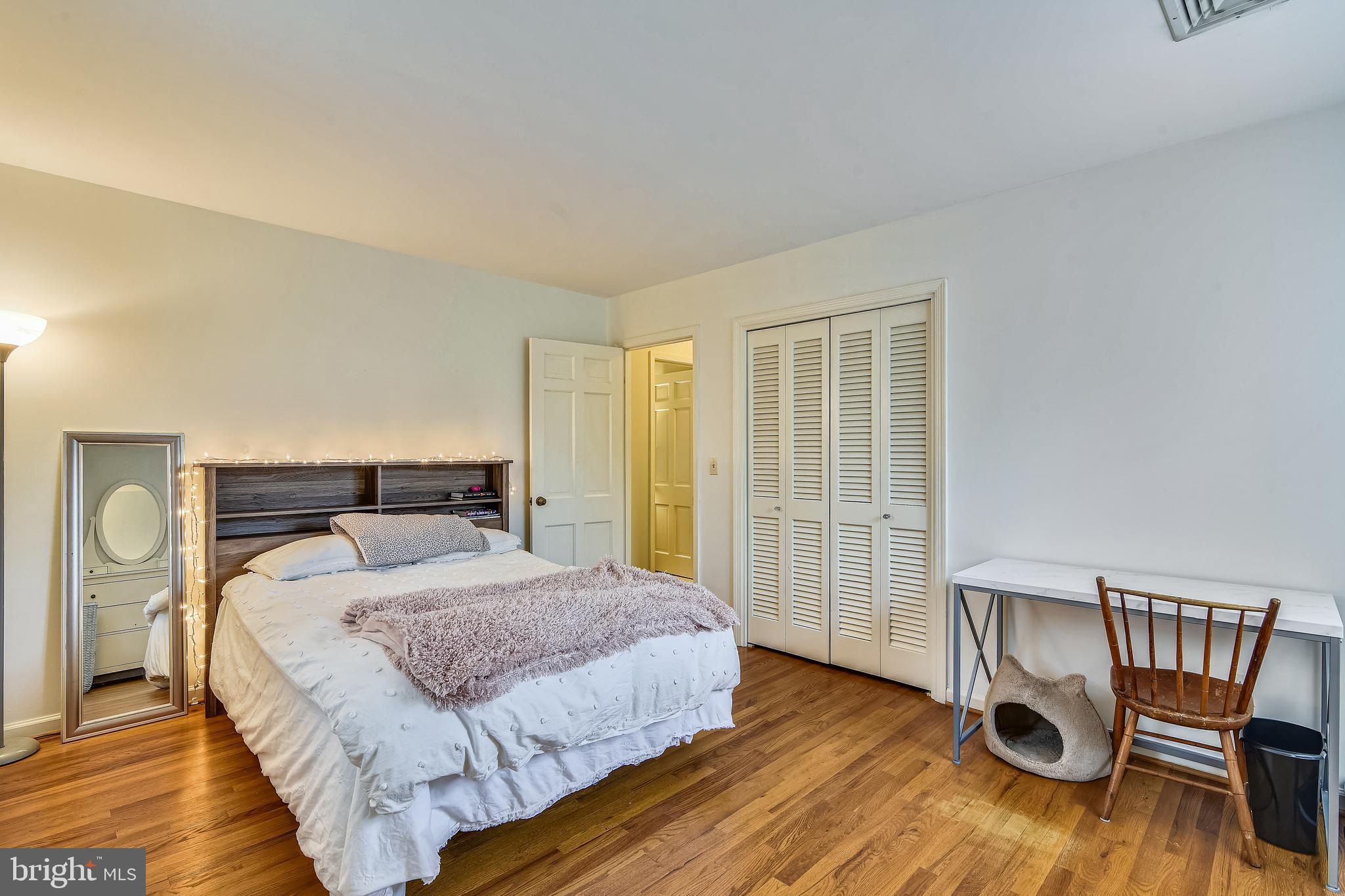 19366 Loudoun Orchard Road Leesburg, VA 20175 - Photo 26 of 40 2 of 3 main level bedrooms with hardwood flooring