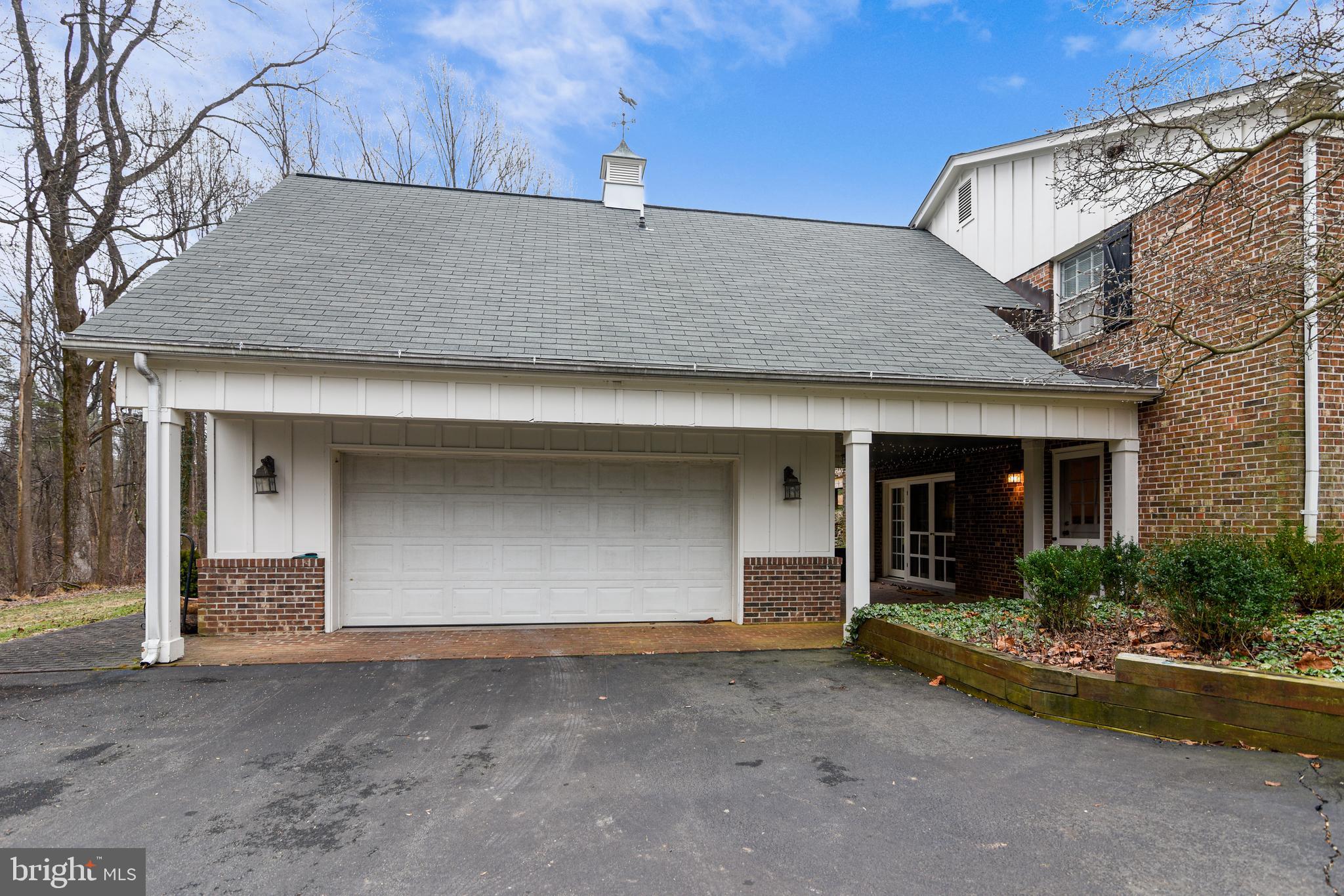 19366 Loudoun Orchard Road Leesburg, VA 20175 - Photo 39 of 40 Oversized 2 car garage with covered porch