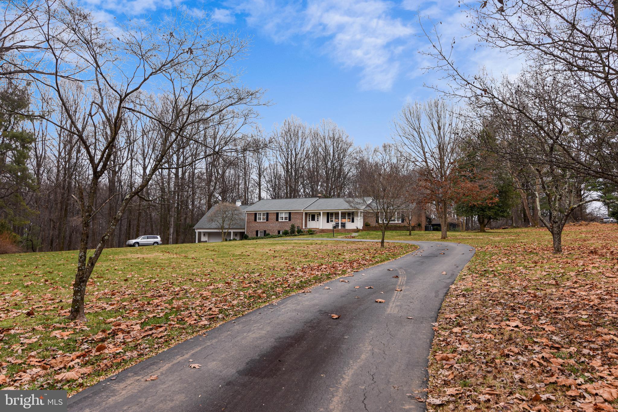 19366 Loudoun Orchard Road Leesburg, VA 20175 - Photo 6 of 40 Paved DW meanders into the private setting