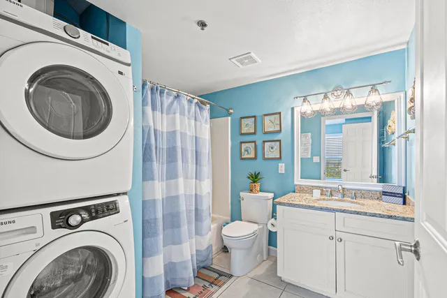 a bathroom with a sink a mirror and a toilet