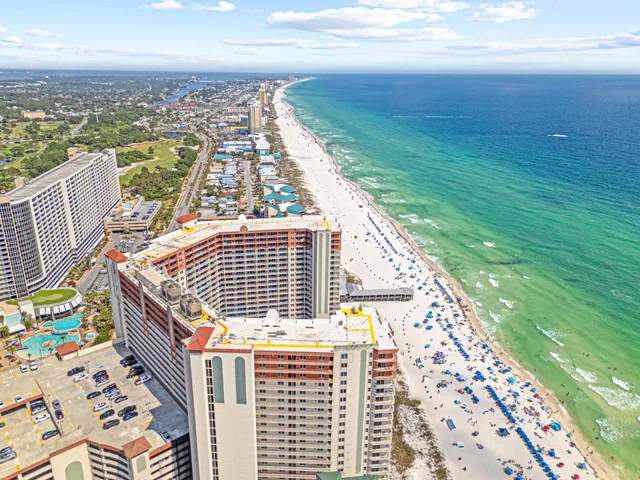 a view of city with ocean