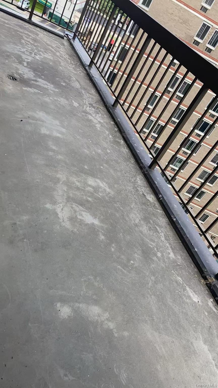 138-35 Elder Avenue, Unit 9DA Queens, NY 11355 - Photo 9 of 9 a view of a black gate