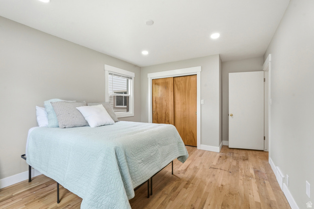 778 East 200 North Logan, UT 84321 - Photo 29 of 43 Room featuring wood-finish flooring, recessed lighting, and a window with blinds