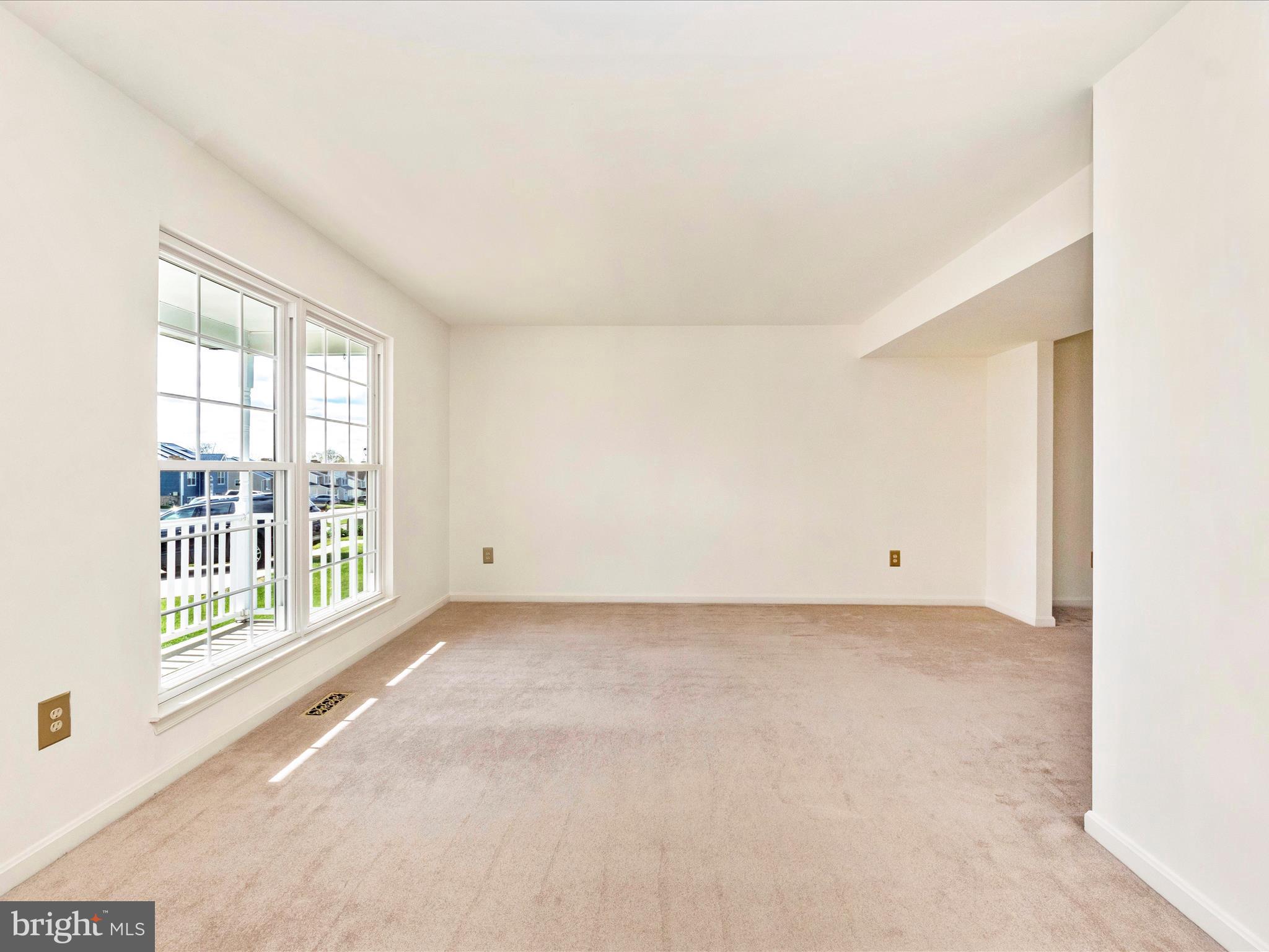 4214 Spring Avenue Halethorpe, MD 21227 - Photo 3 of 58 a view of an empty room with a window