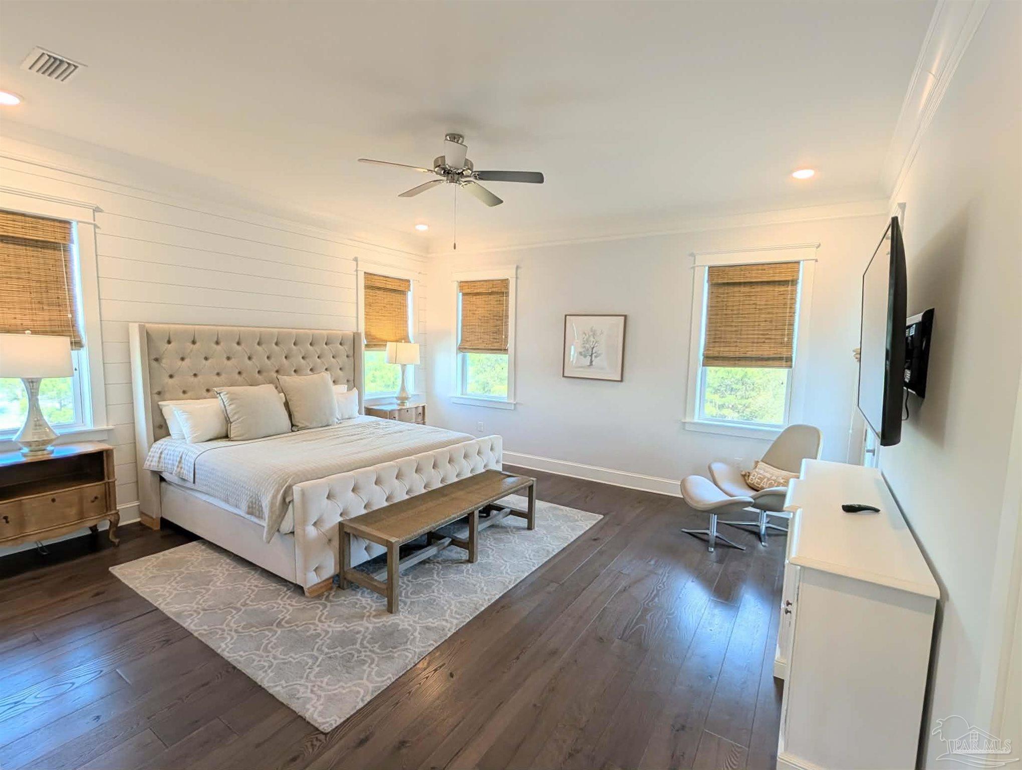 109 East Crabbing Hole Ln Inlet Beach Inlet Beach, FL 32461 - Photo 54 of 66 a bedroom with a bed window and a flat screen tv
