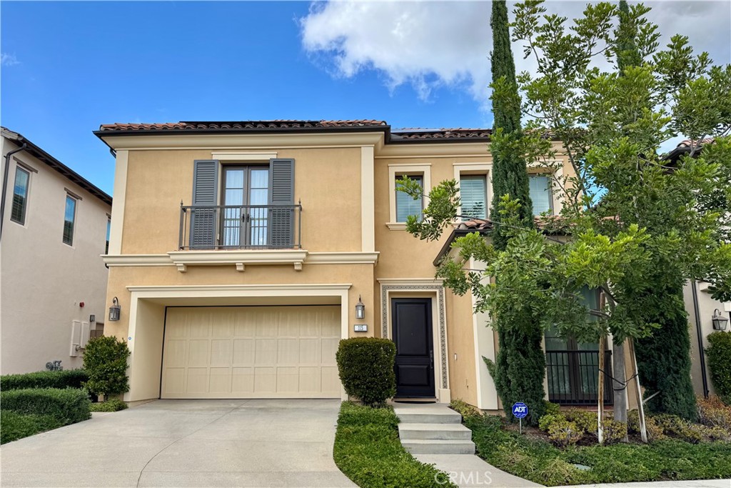 115 Locanda Irvine, CA 92602 - Photo 1 of 28 a front view of a house with garden