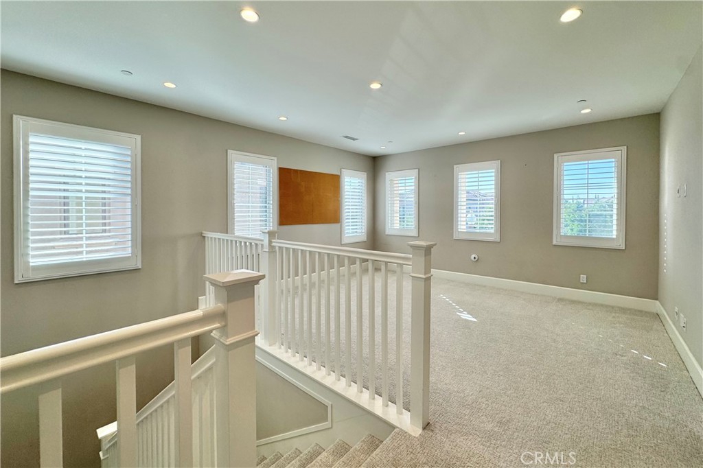 115 Locanda Irvine, CA 92602 - Photo 14 of 28 a view of an empty room with a window