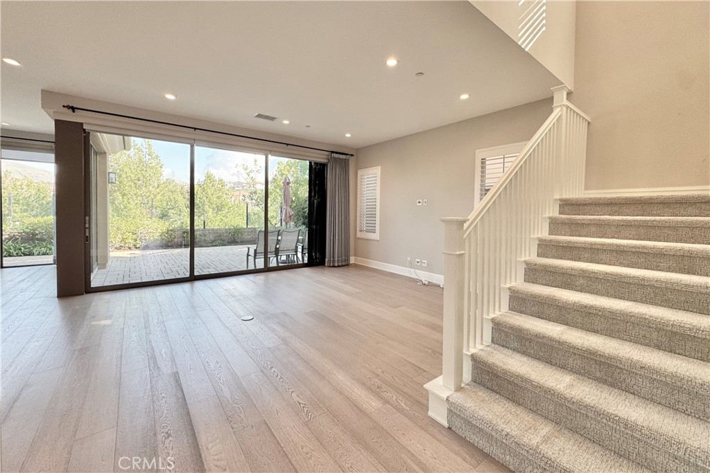 115 Locanda Irvine, CA 92602 - Photo 2 of 28 a view of an entryway with wooden floor