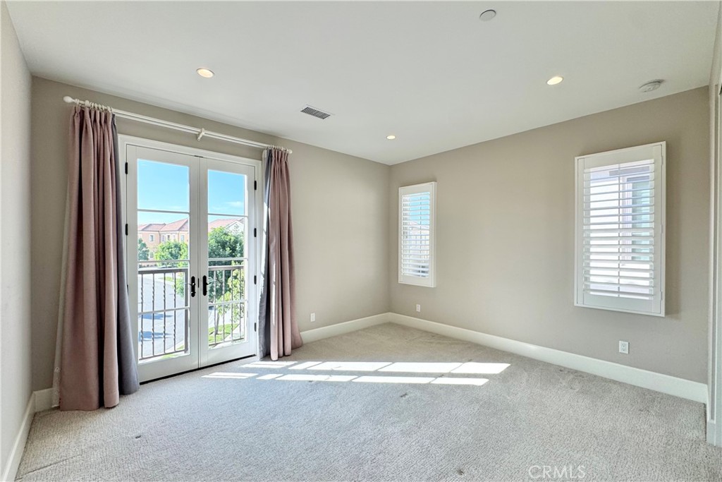 115 Locanda Irvine, CA 92602 - Photo 21 of 28 a view of an empty room with a window