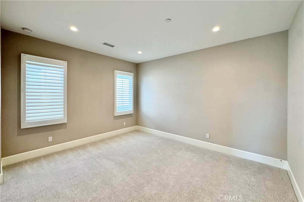 115 Locanda Irvine, CA 92602 - Photo 22 of 28 a view of an empty room with a window