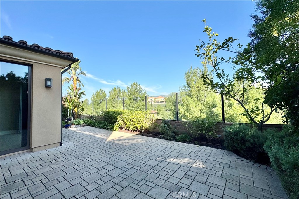 115 Locanda Irvine, CA 92602 - Photo 26 of 28 a view of a pathway with a yard
