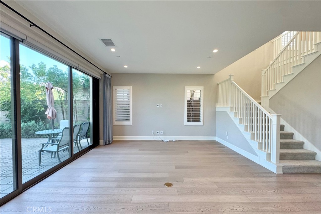 115 Locanda Irvine, CA 92602 - Photo 4 of 28 a view of an entryway with wooden floor