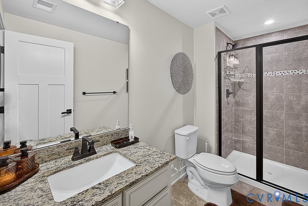 17976 Spotted Oak Road Dumfries, VA 22026 - Photo 25 of 52 Bathroom featuring a granite countertop vanity wit