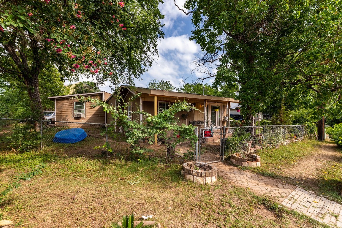 1144 Mason Avenue Austin, TX 78721 - Photo 18 of 37 a view of a house with backyard and sitting area