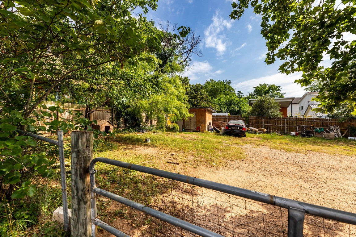1144 Mason Avenue Austin, TX 78721 - Photo 28 of 37 a view of swimming pool with lawn chairs and plants