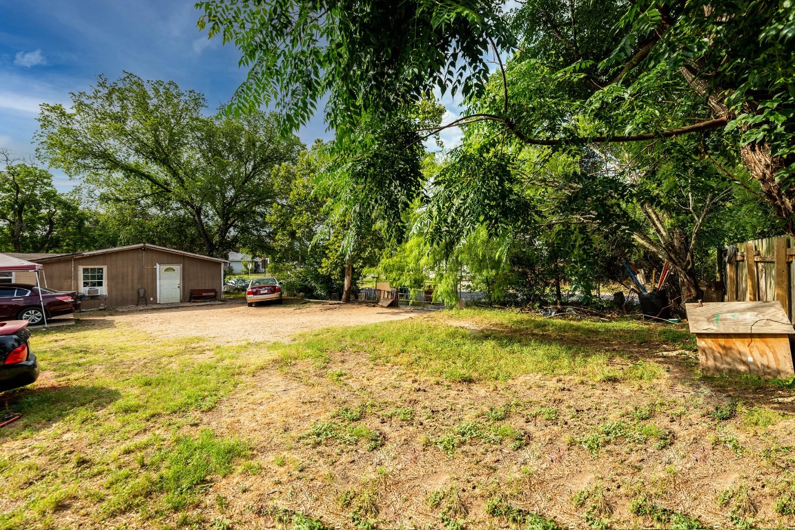 1144 Mason Avenue Austin, TX 78721 - Photo 7 of 37 a front view of a house with a yard and swimming pool