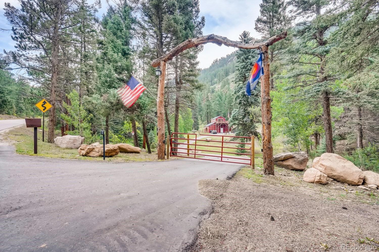13380 South Foxton Road Conifer, CO 80433 - Photo 39 of 40 a childrens park with lots of swings and slides