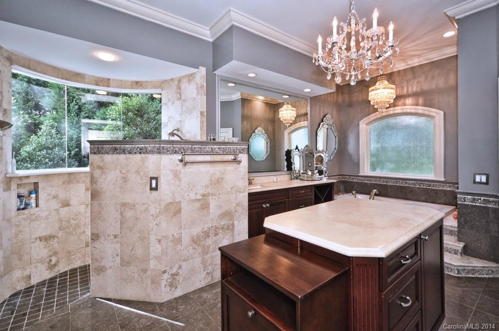 18301 Bowsprit Pointe Road Cornelius, NC 28031 - Photo 13 of 24 a kitchen with a table and chairs