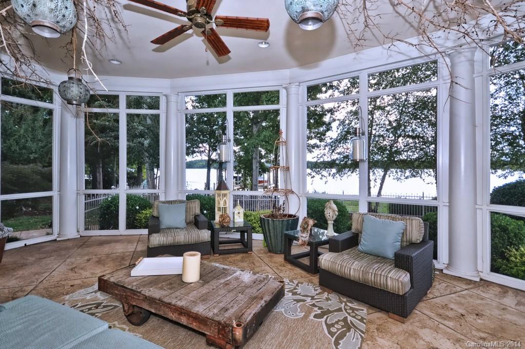 18301 Bowsprit Pointe Road Cornelius, NC 28031 - Photo 19 of 24 a living room with furniture and a large window