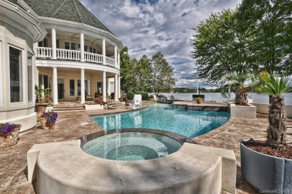 18301 Bowsprit Pointe Road Cornelius, NC 28031 - Photo 20 of 24 a view of a house with pool and sitting area