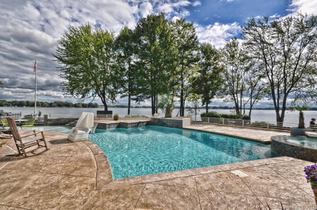 18301 Bowsprit Pointe Road Cornelius, NC 28031 - Photo 21 of 24 a garden view with a sitting space