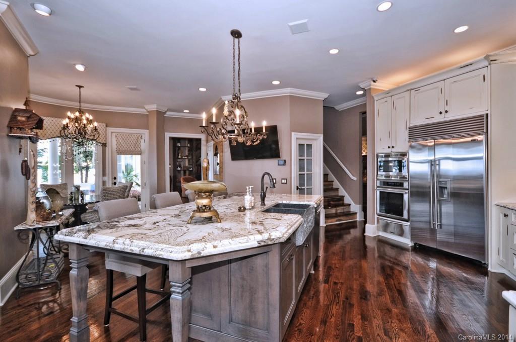 18301 Bowsprit Pointe Road Cornelius, NC 28031 - Photo 6 of 24 a view of a dining room and livingroom