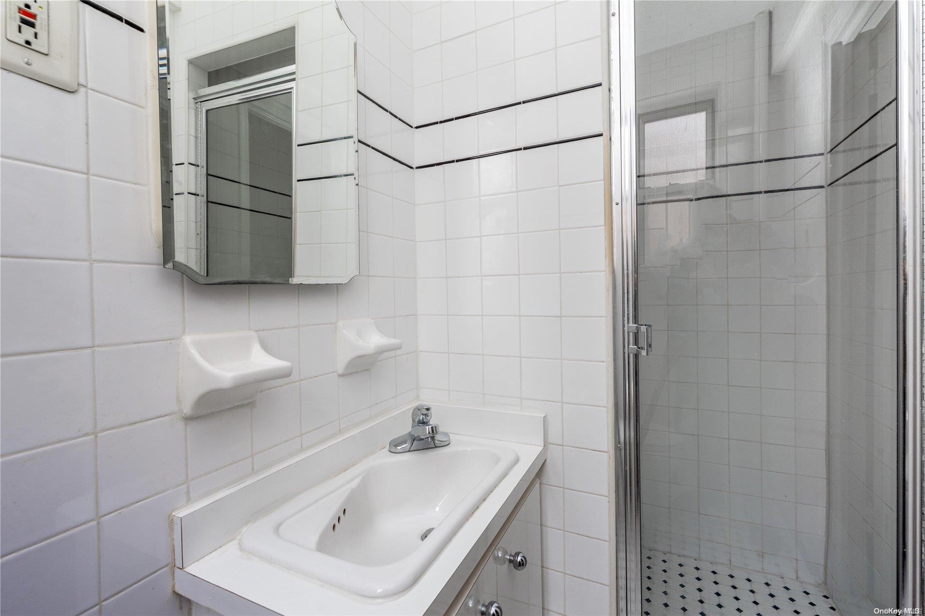 76-12 35th Avenue, Unit 2D Queens, NY 11372 - Photo 6 of 13 Master bAthroom
