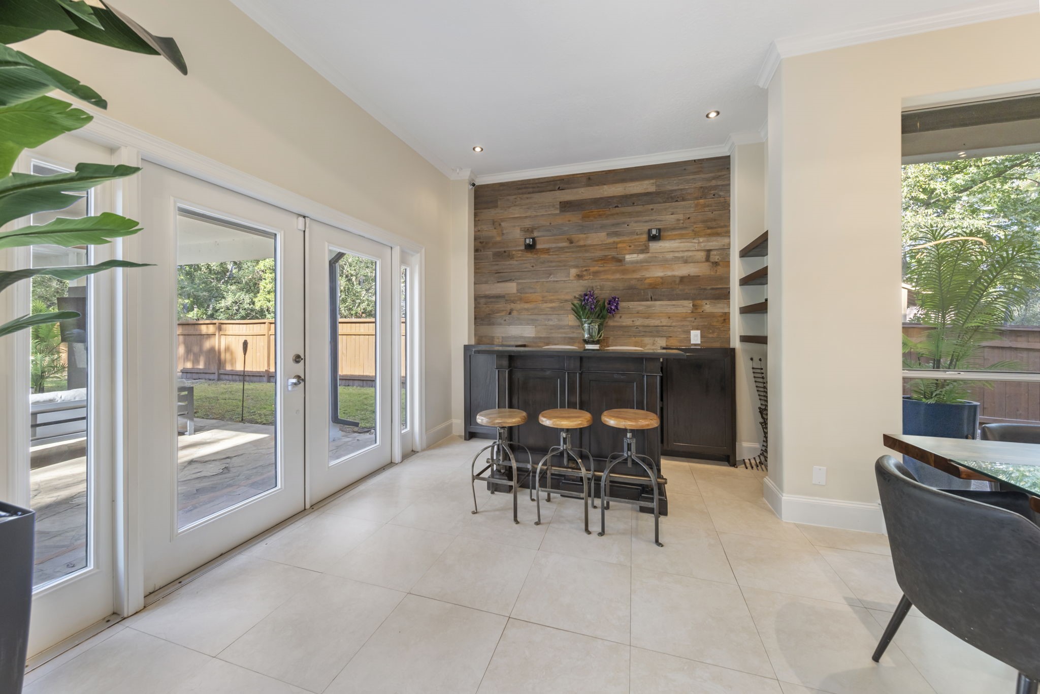 90 West Horizon Ridge Place Spring, TX 77381 - Photo 18 of 36 a dining room with furniture and a floor to ceiling window