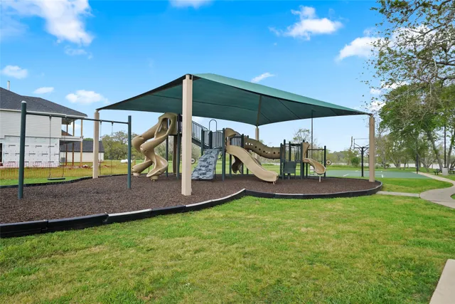 a view of a park with swings