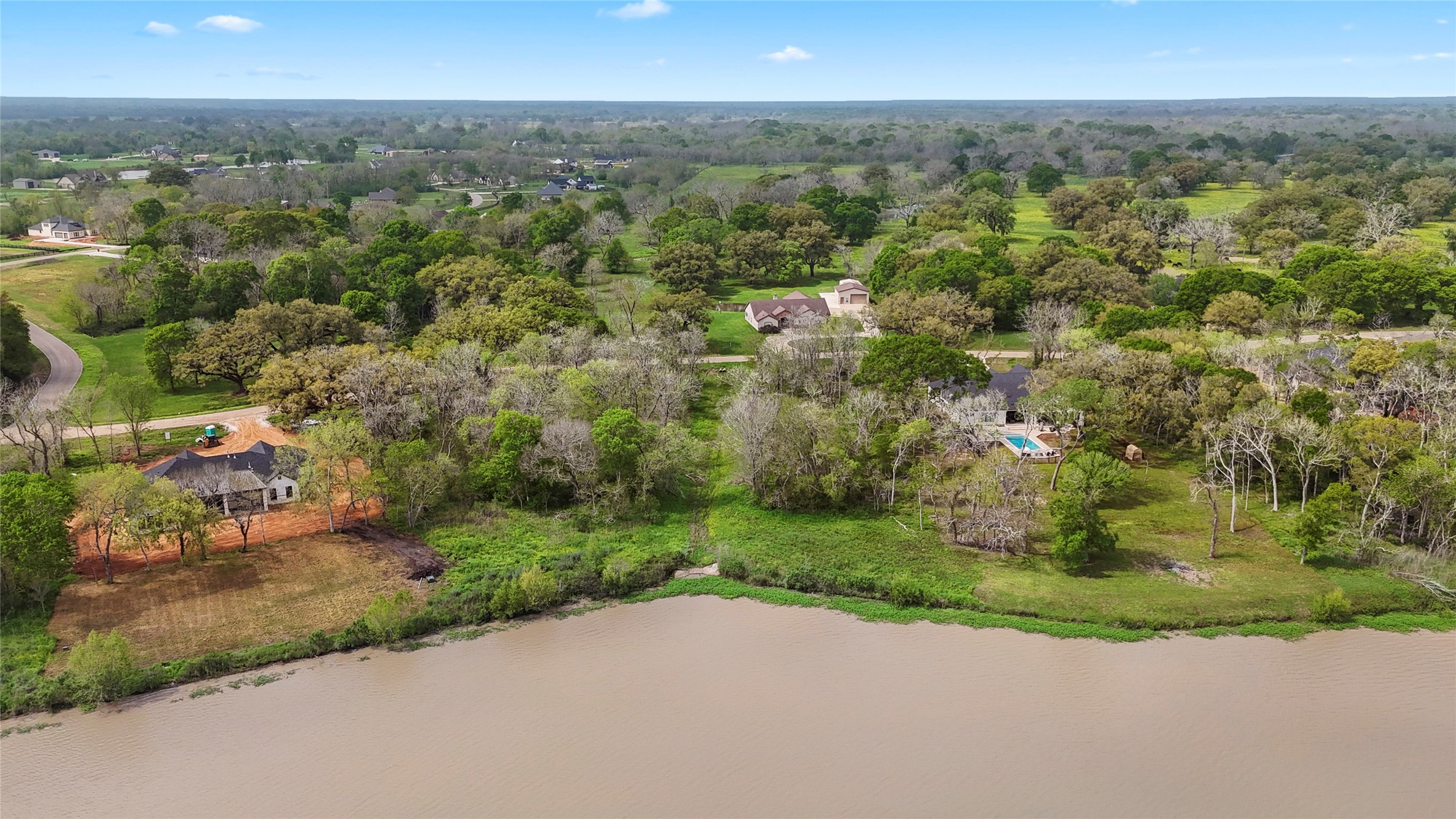 21502 Chenango Lake Drive Angleton, TX 77515 - Photo 2 of 18 an aerial view of a house with a yard