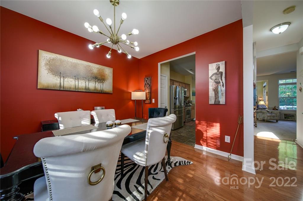 727 Prospect Lane Fort Mill, SC 29708 - Photo 5 of 43 a living room with furniture and a chandelier