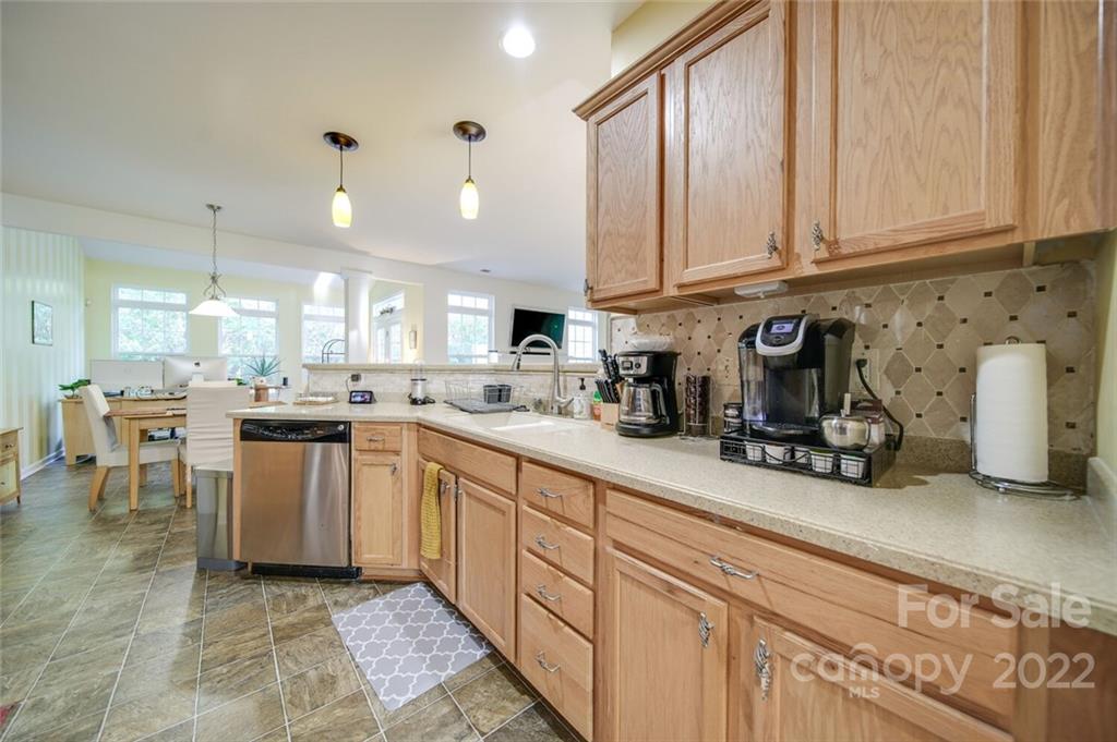 727 Prospect Lane Fort Mill, SC 29708 - Photo 8 of 43 a kitchen with lots of counter top space and appliances